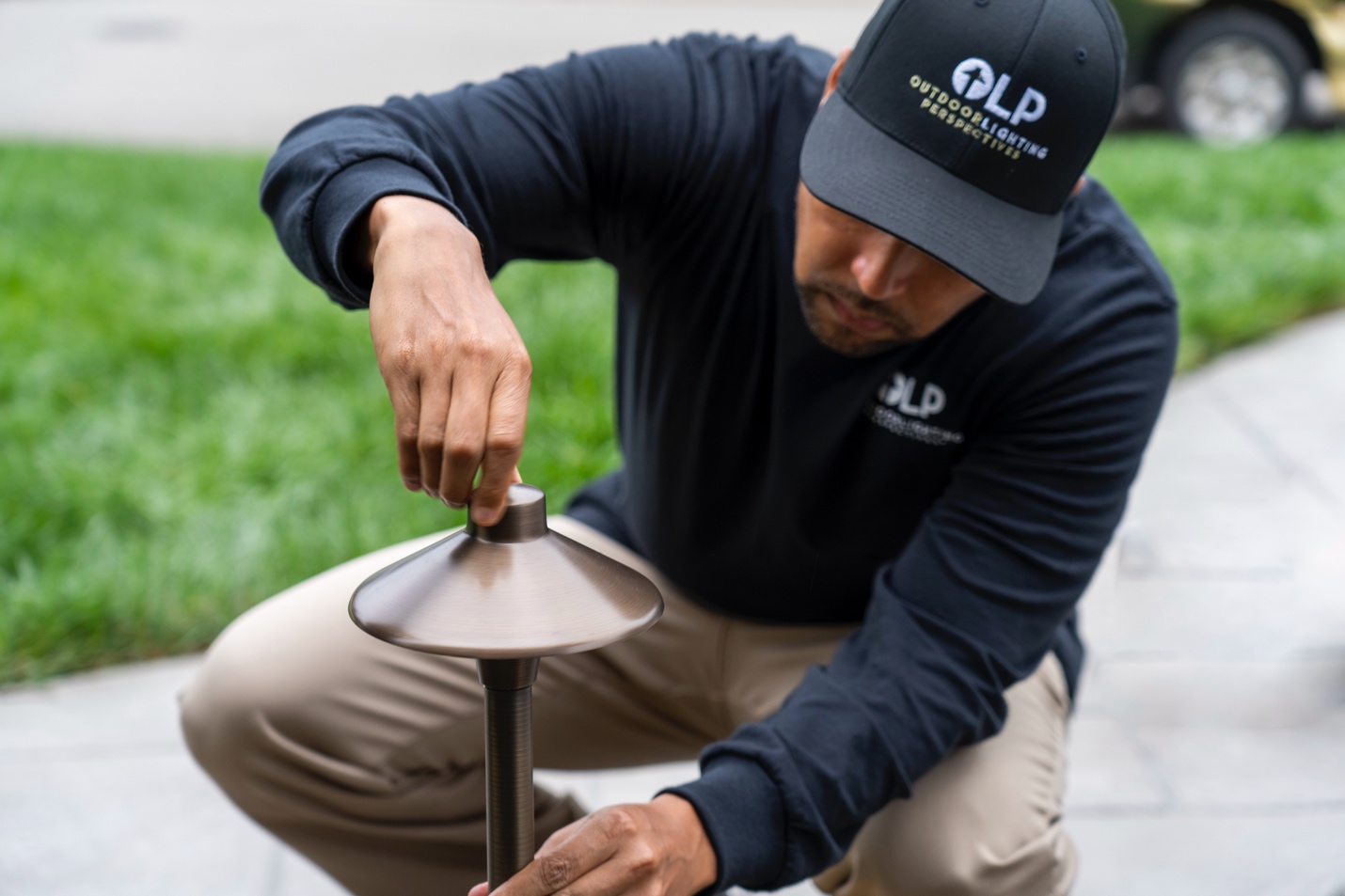 A person fixing a light